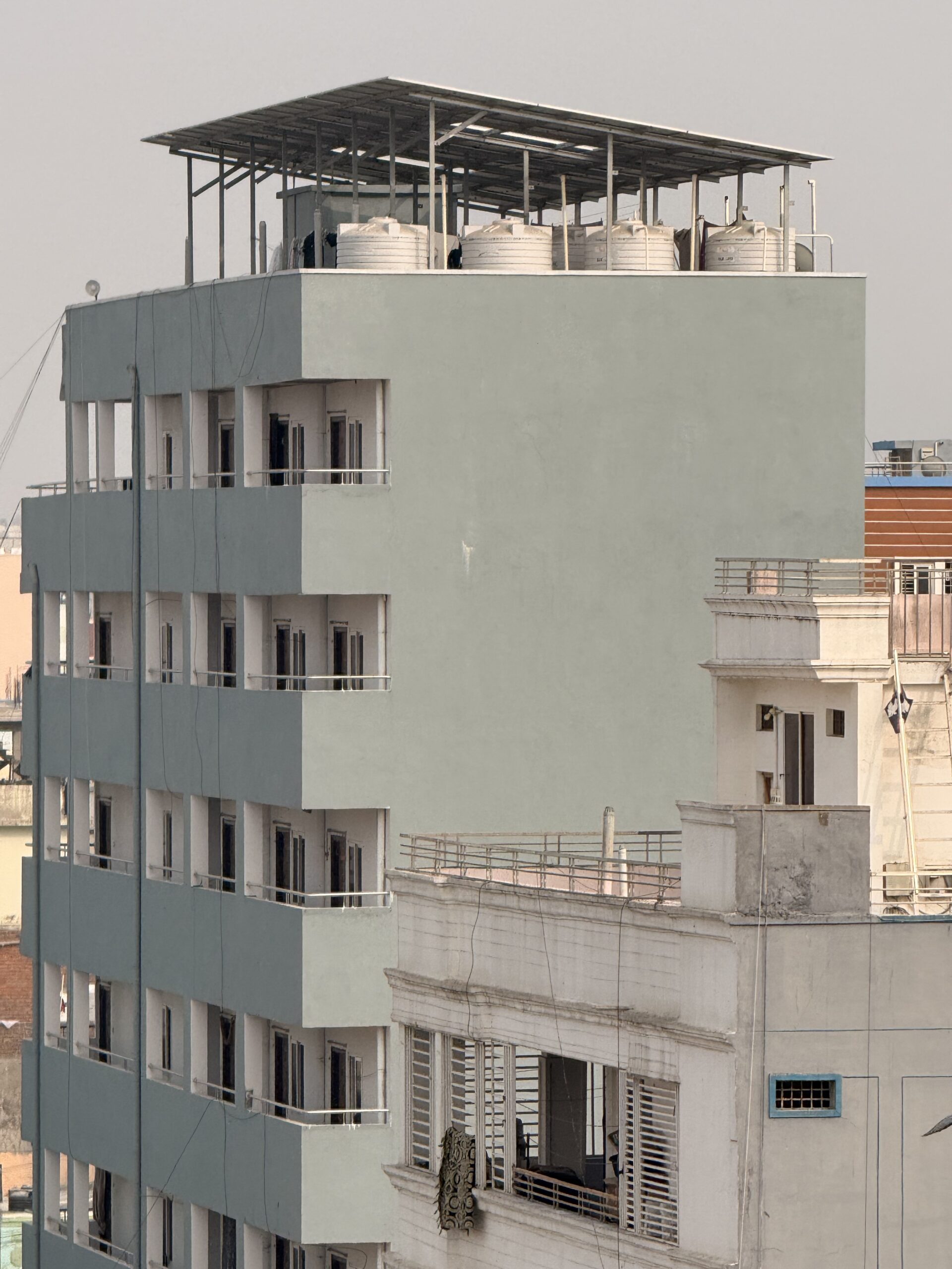 Residential building rooftop solar panel system installed by Pro Solar Security