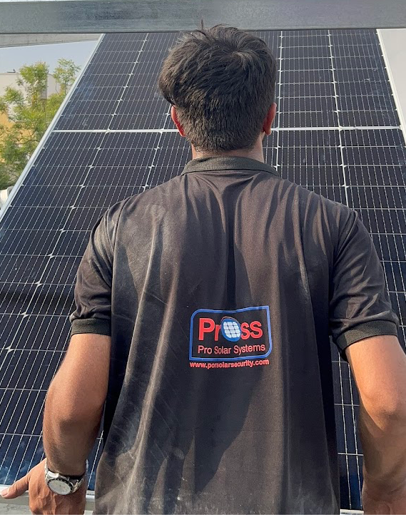 Pro Solar Systems installer standing on a rooftop solar array during fast installation and commissioning in Hyderabad